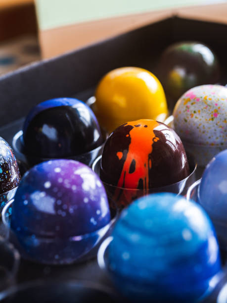 istock Box of artisanal chocolate on wooden table 1222043965