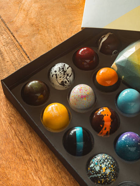 istock Box of artisanal chocolate on wooden table 1222044286