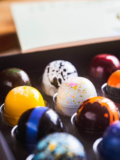 istock Box of artisanal chocolate on wooden table 1222045656