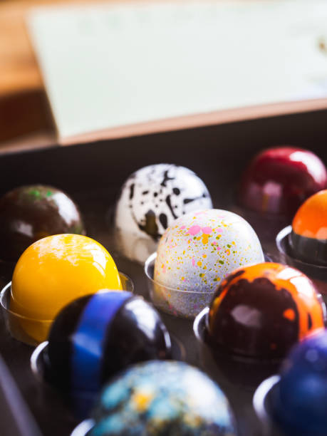 istock Box of artisanal chocolate on wooden table 1222046010