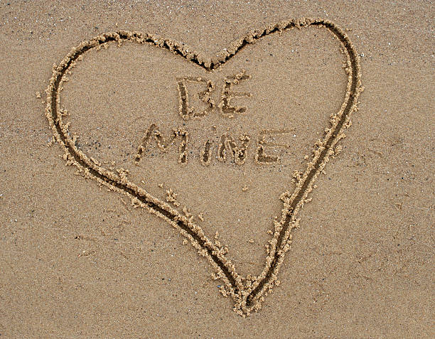 istock Heart in the sand saying 