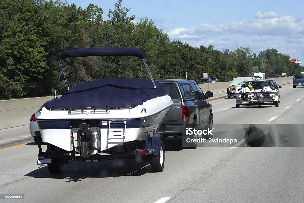 Boote und Jetskis Fahren Sie Ski in den Urlaub. - Lizenzfrei Anhänger Stock-Foto