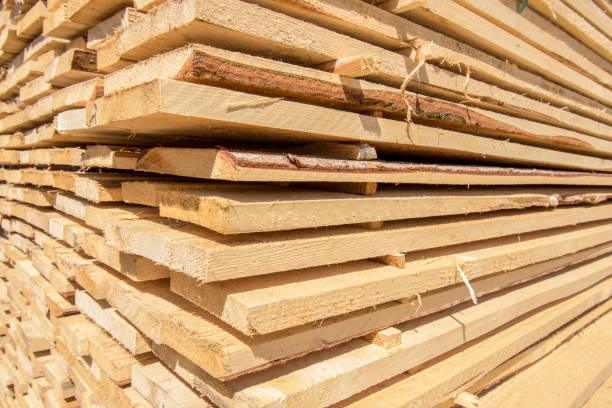 boards and beams basic building material boards and beams basic building material lumber industry timber lumberyard industry stock pictures, royalty-free photos & images