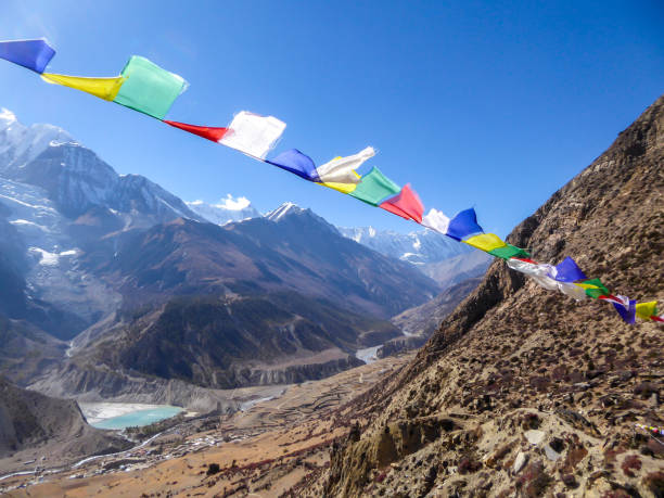istock Praken Gompa - Panoramic view on Himalayan valley with waving prayer flags 1222049241