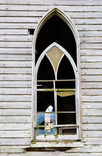 Abandoned Church And Broken Stained Glass Window