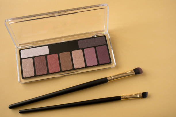 istock Women's cosmetics for the face. Eye shadow and makeup brushes. 1222056182