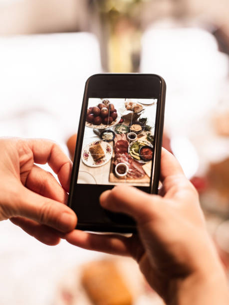 istock Photographing Easter eggs with Brunch food on the table 1222058744