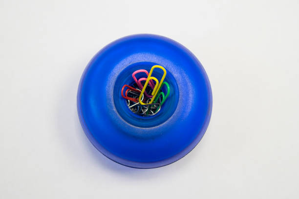 Bright dispenser for paper clips
