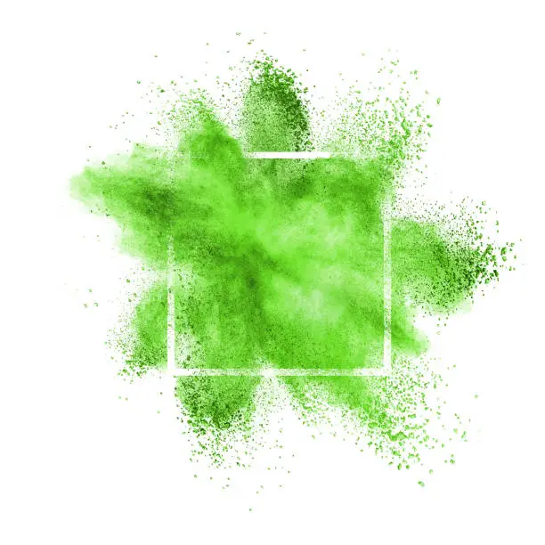 Photo of Green powder explosion in a frame on a white background.