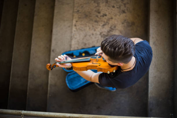 istock Street musician playing violin 1222063309