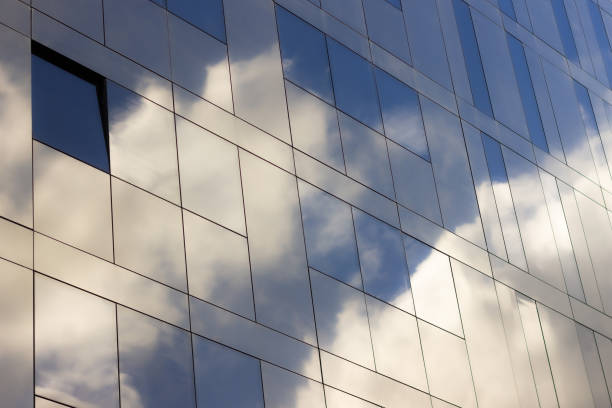 istock Reflections of the sky on a glassy building 1222063522