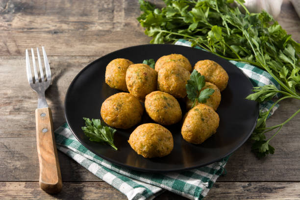 istock Traditional cod fritters decorated with garlic and parsley 1222065433