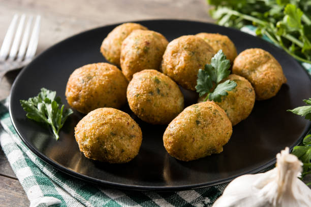 istock Traditional cod fritters decorated with garlic and parsley 1222065573