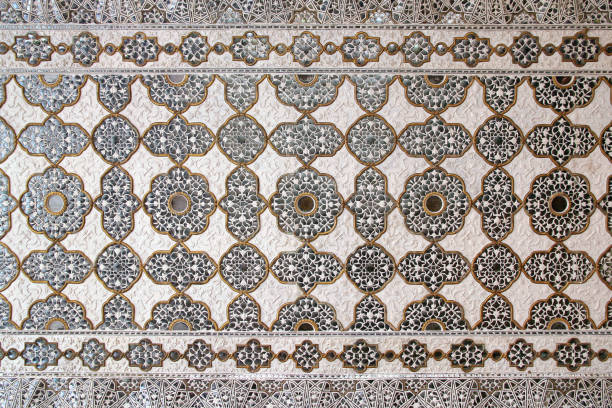 Sheesh Mahal hall totally covered with mirror mosaics in Amber Fort near Jaipur, Rajasthan, India.