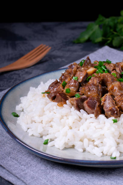 istock Stewed chicken gizzards on the boiled rice 1222067963
