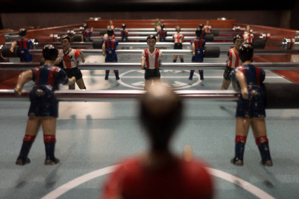 istock foosball players pieces in very close view 1222068012