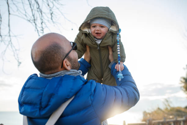 istock Happy father and son at sunset 1222069483