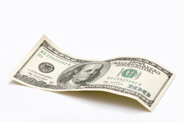 istock One hundred dollars isolated on white background 1222069653