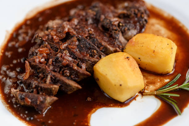 istock steak on a plate with spices 1222070380
