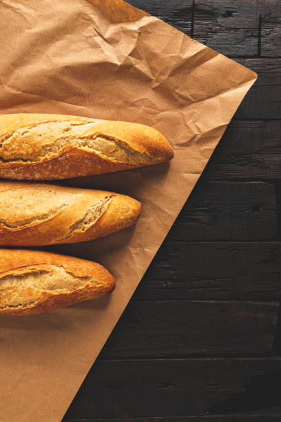 istock Wrapping crunchy french baguettes 1222070822