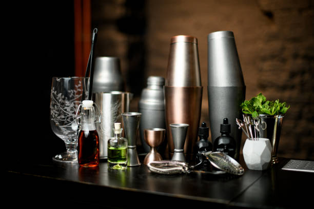 different bar equipment and tools stand on bar counter beautiful view composition with different bar equipment and steel tools which stand on bar counter. pallet jack handle stock pictures, royalty-free photos & images
