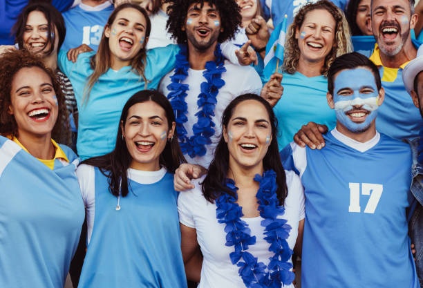 istock Excited Argentinian soccer supporters in stands 1222072513
