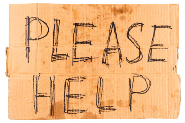 istock dirty rectangular flat sheet of cardboard plackard with words please help, isolated on white background 1222073310