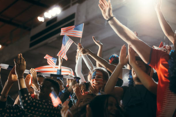 istock US football supporters in fan zone watching a match 1222073414