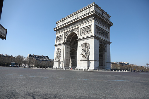Beautiful view of the Arc de Triomphe, empty place France Paris