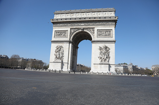 Beautiful view of the Arc de Triomphe, empty place France Paris