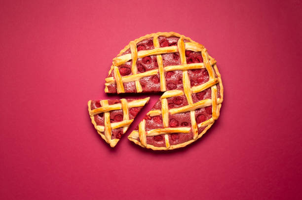 istock Raspberry pie with a lattice crust and one slice. Summer dessert 1222074669
