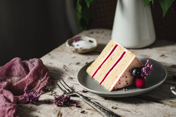 istock Slice of a fresh fruit and flower cake 1222076353