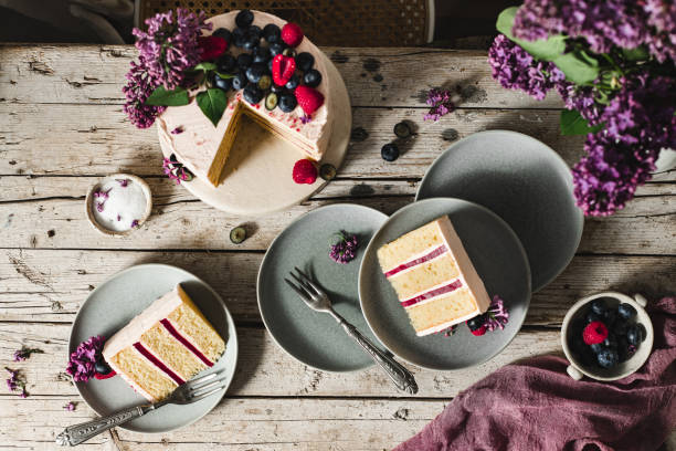 istock Tasty fruit and flower cake served in plates 1222076410