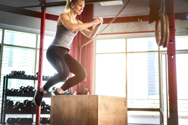 istock Athletes training in a gym gym 1222076860