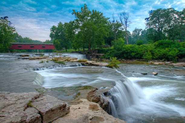 istock Waterfall-Cataract Falls-with covered bridge- On Mill Creek-Owen County Indiana 1222076979