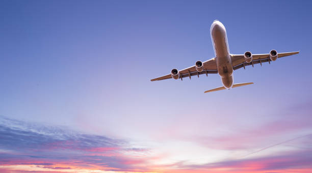 istock Commercial airplane jetliner flying above dramatic clouds. 1222078268