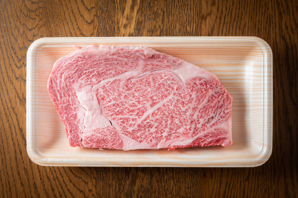japanese wagyu ribeye beef in plastic tray japanese wagyu ribeye beef in plastic tray marbled meat stock pictures, royalty-free photos & images