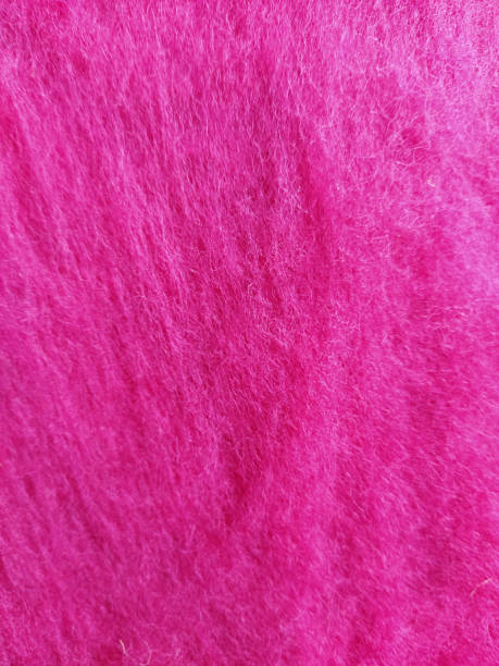 istock Pink  carding wool. Wool for felting texture  background 1222083256