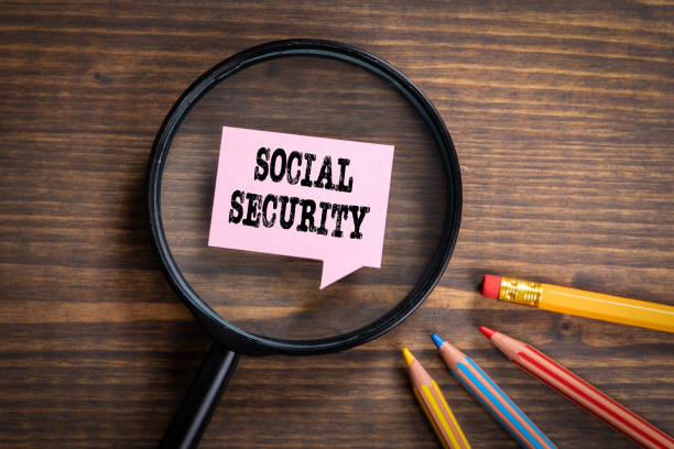 istock SOCIAL SECURITY. Black magnifying glass, speech bubble and colored pencils 1222084738