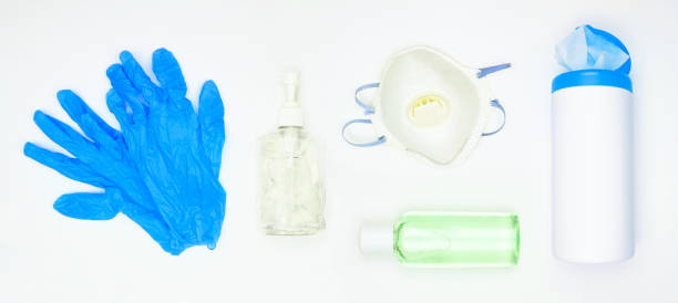Coronavirus prevention equipment and sanitizer set on a white background