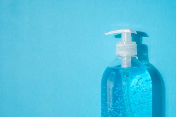 istock Hand sanitizer in a bottle on a bright background. Coronavirus prevention concept. 1222084859