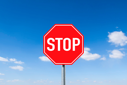 Stop Sign on blue sky