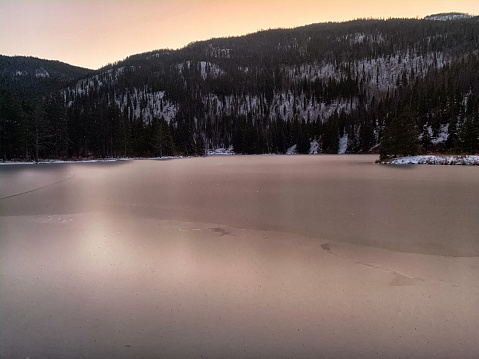 Sunset Over Frozen Officer's Gulch (Lake) Between Frisco and Copper Mountain, Colorado in Winter