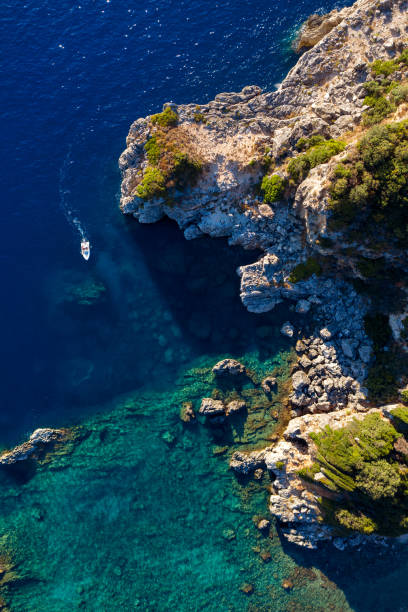 istock Secluded lagoon in mediterranean sea aerial 1222099803