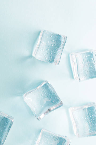 istock Colored banner with fresh ice cubes and reflections 1222102456