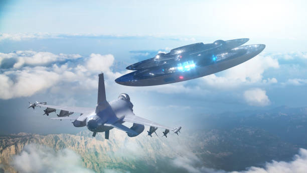 istock UFO flies away from a military plane, 3d render 1222104336