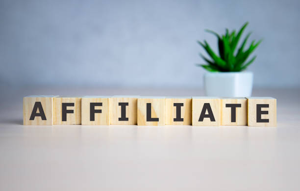 istock AFFILIATE word made with building blocks on blue. 1222106299