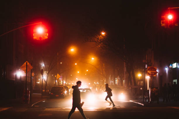 Man Walking down an empty Street in New York city, Tompkins square park lower east side