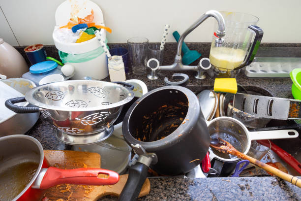 istock Sink full of dishes to wash 1222109802