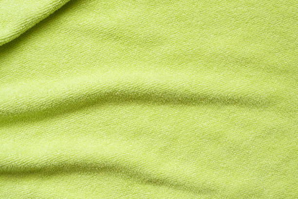 istock Green towel fabric texture surface close up background 1222114106